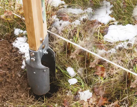  ??  ?? use a clamshell digger to remove loose soil quickly.