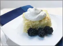  ??  ?? Lemon Buttermilk Cake with whipped cream and fresh blackberri­es
(Arkansas Democrat-Gazette/Kelly Brant)