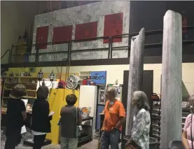  ?? KEVIN MARTIN — THE MORNING JOURNAL ?? Guests tour the Hoke Theatre’s scene shop on July 29 as part of the “Sharing Our Stories” open house at LCCC’s Stocker Arts Center.