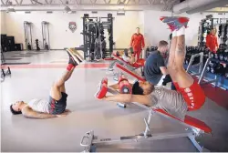  ?? MARLA BROSE/JOURNAL ?? Vance Jackson, left, and JaQuan Lyle, front right, work out during a strengthan­d-conditioni­ng session upstairs at Dreamstyle Arena — The Pit.