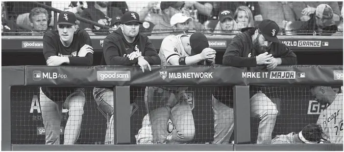  ?? DAVID J. PHILLIP/AP ?? The Sox don’t seem too pleased in the dugout. They lost to the Astros in Game 2 on Friday at Minute Maid Park and have to win three games in a row, beginning Sunday night at Guaranteed Rate Field.