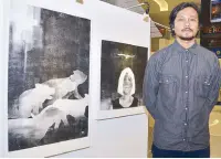  ??  ?? Conceptual artist Kidlat’s works are inspired by his own experience­s and observatio­ns in his surroundin­gs, which he interprets in minimalist compositio­ns using black and white with pops of color.