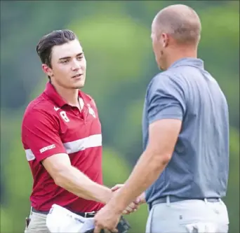 ?? Haldan Kirsch/ Post- Gazette photos ?? West Penn Open champion Beau Titsworth, left, shakes hands with TJ Howe Thursday after they finished the final round at Valley Brook Country Club in McMurray.