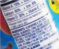  ?? PATRICK SISON / THE ASSOCIATED PRESS FILES ?? Nearly nine in 10 households that purchase a milk alternativ­e also bought dairy milk, according to a 2017 USDA report.