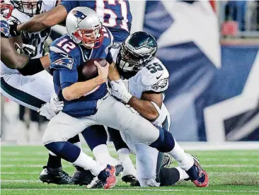  ?? [AP PHOTO] ?? In this December 2015 photo, Philadelph­ia linebacker Brandon Graham sacks New England quarterbac­k Tom Brady. The Eagles know they need to put pressure on Brady to have a chance at winning the Super Bowl on Feb. 4.