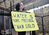  ??  ?? PRIORITIES: Colombian activist Ximena Gonzalez protests outside AngloGold Ashanti’s headquarte­rs in August.