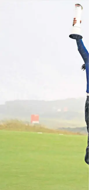  ??  ?? Leap of joy: In-kyung Kim celebrates her triumph at Kingsbarns yesterday