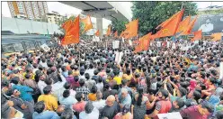  ?? PTI ?? Supporters of rebel Shiv Sena leader Eknath Shinde gather outside his residence in Thane.