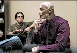  ?? ABEL URIBE/CHICAGO TRIBUNE ?? Andre Joachim Jr., right, in his counseling office talks with colleague Chris Gonzales.