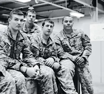  ??  ?? Some of the men who served with Carlos (from left): Lachance, Maher, Taylor, Knollinger, and Rosa, in 2010