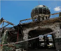  ?? (Eloisa Lopez/Reuters) ?? THE WAR-TORN Grand Mosque is seen shut down in May in Marawi City, Lanao province, Philippine­s.