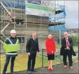  ?? ?? Neil Donald, Head of OVO Energy Solutions with Cabinet Minister Michael Matheson, Iona MacPhail from Argyll & Bute Council and ACHA chief executive Alastair MacGregor