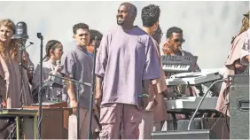  ?? RICH FURY/GETTY IMAGES FOR COACHELLA ?? Kanye West performs during the 2019 Coachella Valley Music And Arts Festival in April.