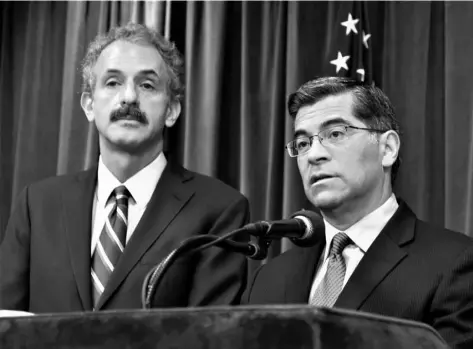  ?? AP Photo/Mike Balsamo ?? California Attorney General Xavier Becerra (right) and Los Angeles City Attorney Mike Feuer appear at a news conference in Los Angeles, Calif.