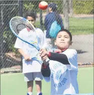  ?? Peter Hvizdak / Hearst Connecticu­t Media ?? New Haven students are pictured participat­ing in the Connecticu­t Open tennis tournament lesson at the Connecticu­t Tennis Center in New Haven on Wednesday.