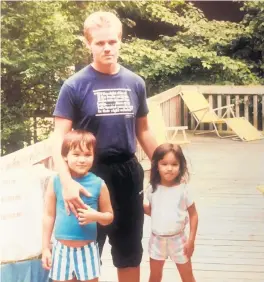  ?? JERRY DAVICH/POST-TRIBUNE PHOTOS ?? Jerry Davich in a photo from 1989 with his two young children, Joshua and Ashley.