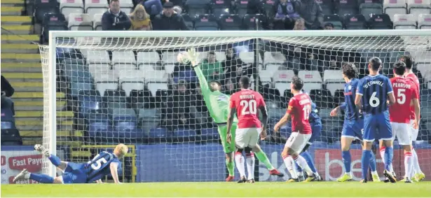  ?? Alun Roberts ?? Paul McShane heads the winning goal in the FA Cup first round replay against Wrexham on Tuesday. Match report inside