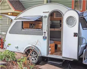  ?? AIRBNB ?? Staying in this tiny camper is billed as "a stylish camping experience in a quaint urban garden setting."