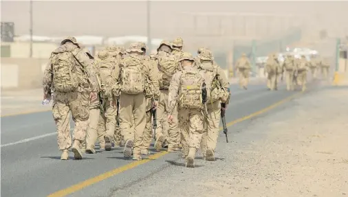  ?? CANADIAN FORCES COMBAT CAMERA/DND ?? Royal Canadian Air Force members take part in an exercise in Kuwait in February as part of the mission against ISIL.
