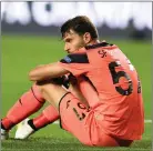  ?? The Associated Press ?? Atalanta goalkeeper Marco Sportiello reacts after his team’s loss in the Champions League quarterfin­al against PSG in Lisbon, Portugal, Wednesday.