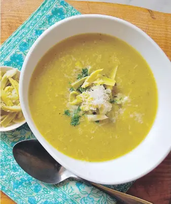  ??  ?? Asparagus and artichokes star in this soup you could serve for lunch with bread.