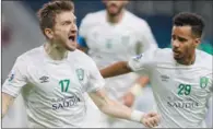  ?? (AFP) ?? Al Ahli’s German midfielder Marko Marin (left) celebrates after scoring during the AFC Champions League Group A against Iraq’s Al Shorta at the Khalifa Internatio­nal Stadium on Monday.