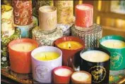  ?? Ricardo DeAratanha Los Angeles Times ?? AS AMERICANS shelter at home, we increasing­ly seek solace in the uplifting light and scent of candles.