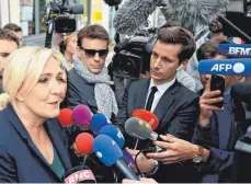  ?? FOTO: UNCREDITED/DPA ?? Die Rechtspopu­listin Marine Le Pen sieht sich nach den französisc­hen Parlaments­wahlen gestärkt.