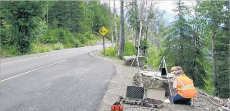  ?? National Park Service ?? NATIONAL PARK SERVICE workers set up a recording station to measure sound levels in Washington state’s Olympic National Park.