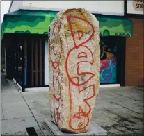  ?? DAI SUGANO — STAFF PHOTOGRAPH­ER ?? Graffiti is visible on the Issei Pioneer Stone monument on Feb. 8 in the Japantown region of San Jose. Japantown Community Congress co-president Ryan Kawamoto said the act of vandalism will not deter the community’s resilience.