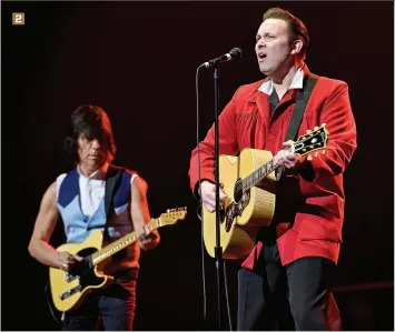  ?? ?? 2. Rockabilly guitarist (and, as it turns out, fellow muscle car enthusiast) Darrel Higham on stage with Beck at the Cadillac Palace Chicago in 2011 2