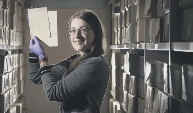  ?? PICTURE: JOHN DEVLIN ?? 0 Glasgow School of Art archivist Rachael Jones with some of the documents and letters she discovered during a project to catalogue papers