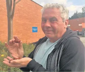  ??  ?? Pictured is Coun Roy Campsall who in conjunctio­n with the Echo, has launched the Conker Competitio­n 2017.