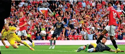  ?? GETTY IMAGES ?? Finishing school: Rashford hits his second of the game at a jubilant Old Trafford