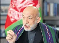  ?? AP PHOTO ?? Afghanista­n’s former president Hamid Karzai speaks during an interview with the Associated Press in Kabul, Afghanista­n, Wednesday.