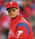  ?? DREW HALLOWELL / GETTY IMAGES ?? Phillies manager Gabe Kapler walks to the dugout in April during a game against the Miami Marlins. Kapler turned his career around after getting booted out of college before the end of his first semester.