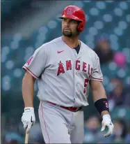  ?? AP-Ted S. Warren ?? Los Angeles Angels Albert Pujols walks to the dugout after he was called out on strikes during the ninth inning May 2.