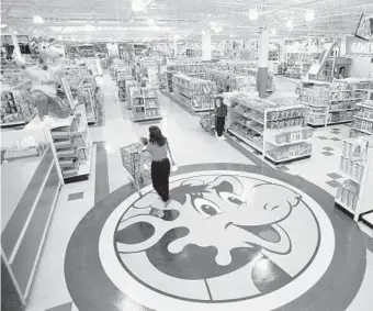  ?? DANIEL HULSHIZER/AP ?? Plans are underway for several of the 10 Toys R Us stores that closed across South Florida.