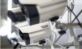  ?? Photograph: Fred Dufour/AFP/Getty Images ?? Hikvision security cameras for sale at an electronic­s mall in Beijing in May 2019.