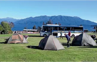  ??  ?? Lake Brunner Motor Camp owners have spent thousands upgrading their facilities and say it is galling to have freedom campers bypass them to stay on publicly owned lakeside land at nearby Iveagh Bay.