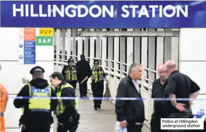  ??  ?? Police at Hillingdon undergroun­d station