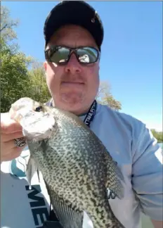  ?? Courtesy of Joe Fazio ?? Joe Fazio, publisher of the “Crappie Crushin’ TV” YouTube channel, caught and released this black crappie at Lake Arthur.