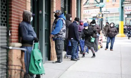  ??  ?? Residents in New York in a queue for food donations. Another 3 million people applied for unemployme­nt benefits last week. Photograph: G Ronald Lopez/Zuma Wire/Rex/Shuttersto­ck