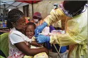  ?? ASSOCIATED PRESS ?? A child is vaccinated against Ebola in Beni, Congo. After nearly a year and some 171,000 doses given, the epidemic shows few signs of waning.