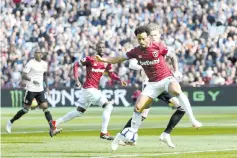  ?? — AFP photo ?? West Ham’s Felipe Anderson scores the opening goal against Manchester United at the London Stadium.