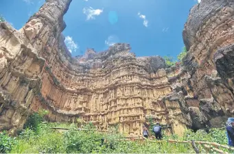  ??  ?? Situated in Mae Wang National Park in Doi Lo district, Pha Chor is a 30m-high cliff created by the uplift of the Earth’s plate and erosion by wind and rain. Five million years ago, this area was a part of the Ping River, which has changed its course.