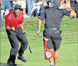  ??  ?? Tiger Woods and caddie Steve Williams celebrate at Torrey Pines 13 years ago