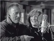  ?? APPLE TV+ ?? Bruce Springstee­n and his wife, Patti Scialfa, share a microphone in “Letter to You.”