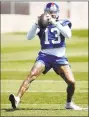  ?? Adam Hunger / Associated Press ?? Giants receiver Odell Beckham makes a catch during practice Tuesday in East Rutherford, N.J.