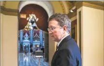  ?? J. Scott Applewhite / Associated Press ?? Conservati­ve House Republican Rep. Thomas Massie, R-Ky., leaves after speaking to reporters at the Capitol where he blocked a unanimous consent vote on a long-awaited $19 billion disaster aid bill in the chamber on Tuesday.